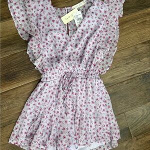 Floral Pink Romper from Nordstrom. Row a brand , size small, NWT